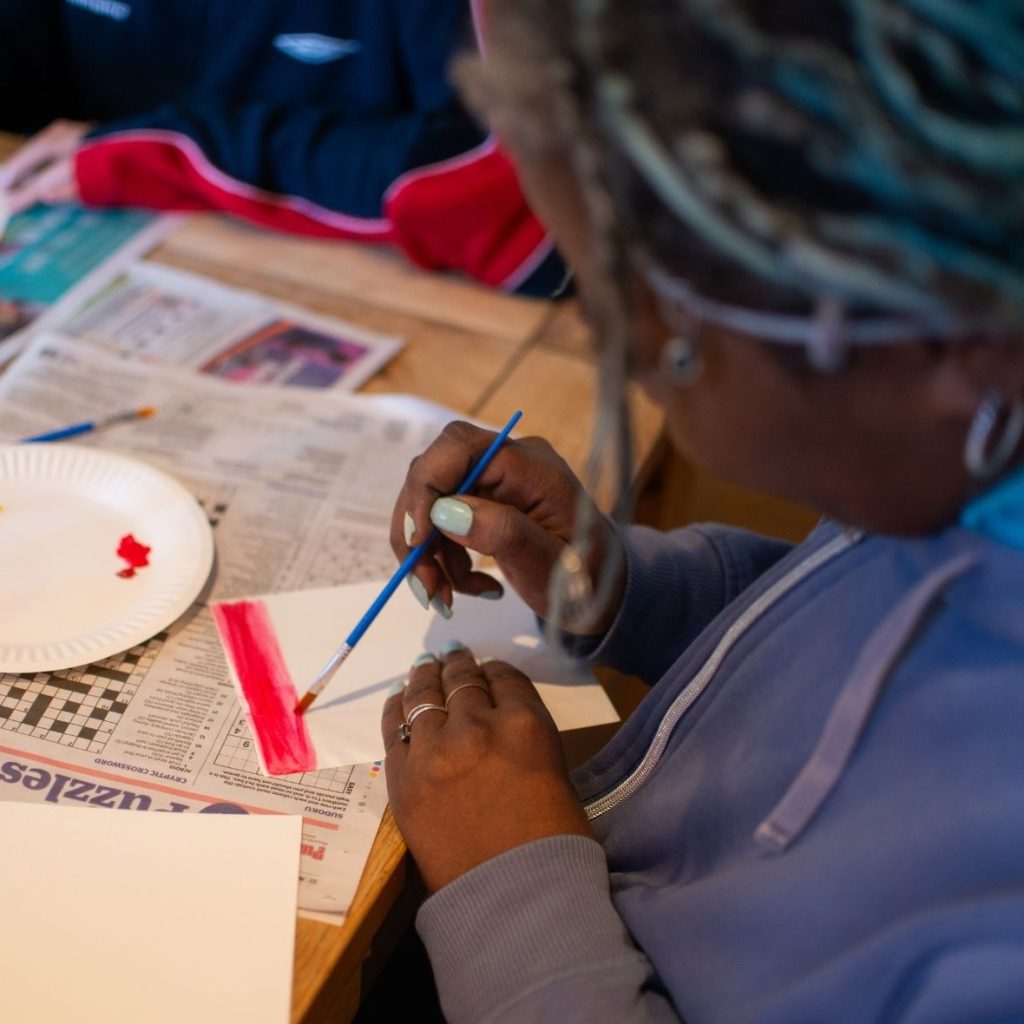 St Mungo's client taking part in an art workshop